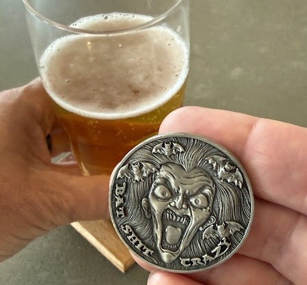B.S.C. Coin banshee side with a beer